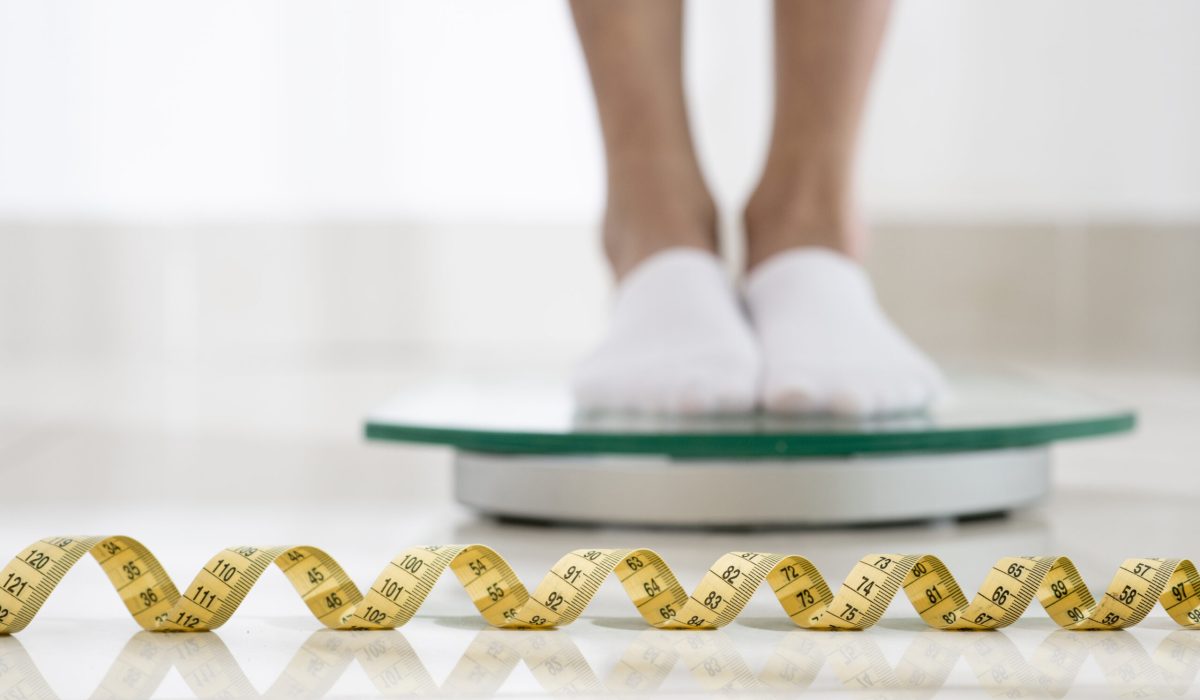 close-up-legs-weight-machine